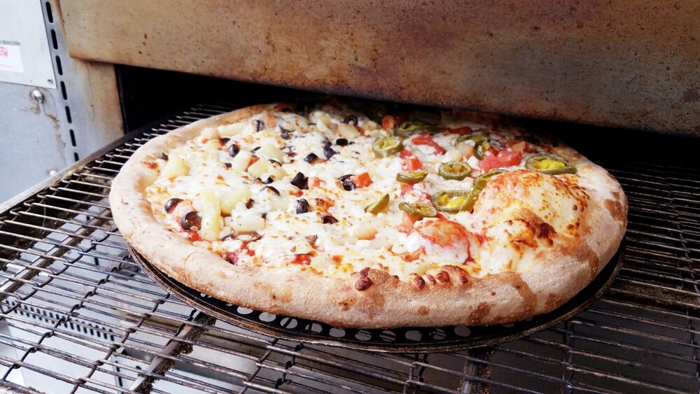 ¿Cuál es la mejor manera de recalentar la pizza de Papa John's?